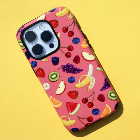 The fruit salad phone case against a yellow background.