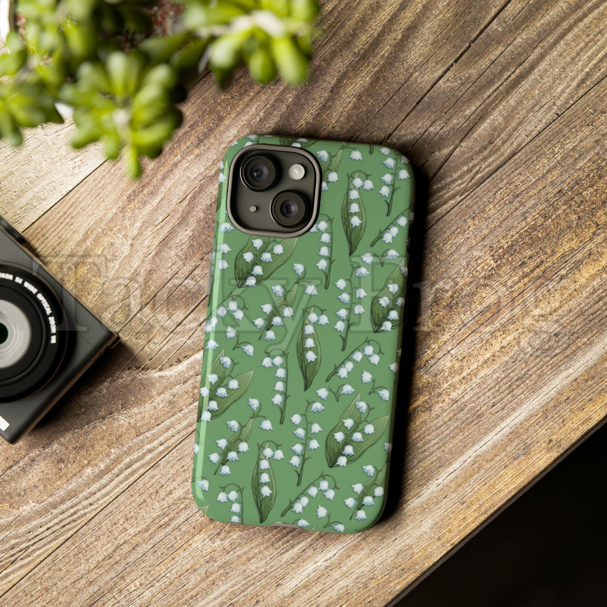 A mockup of the lilies of the valley phone case.