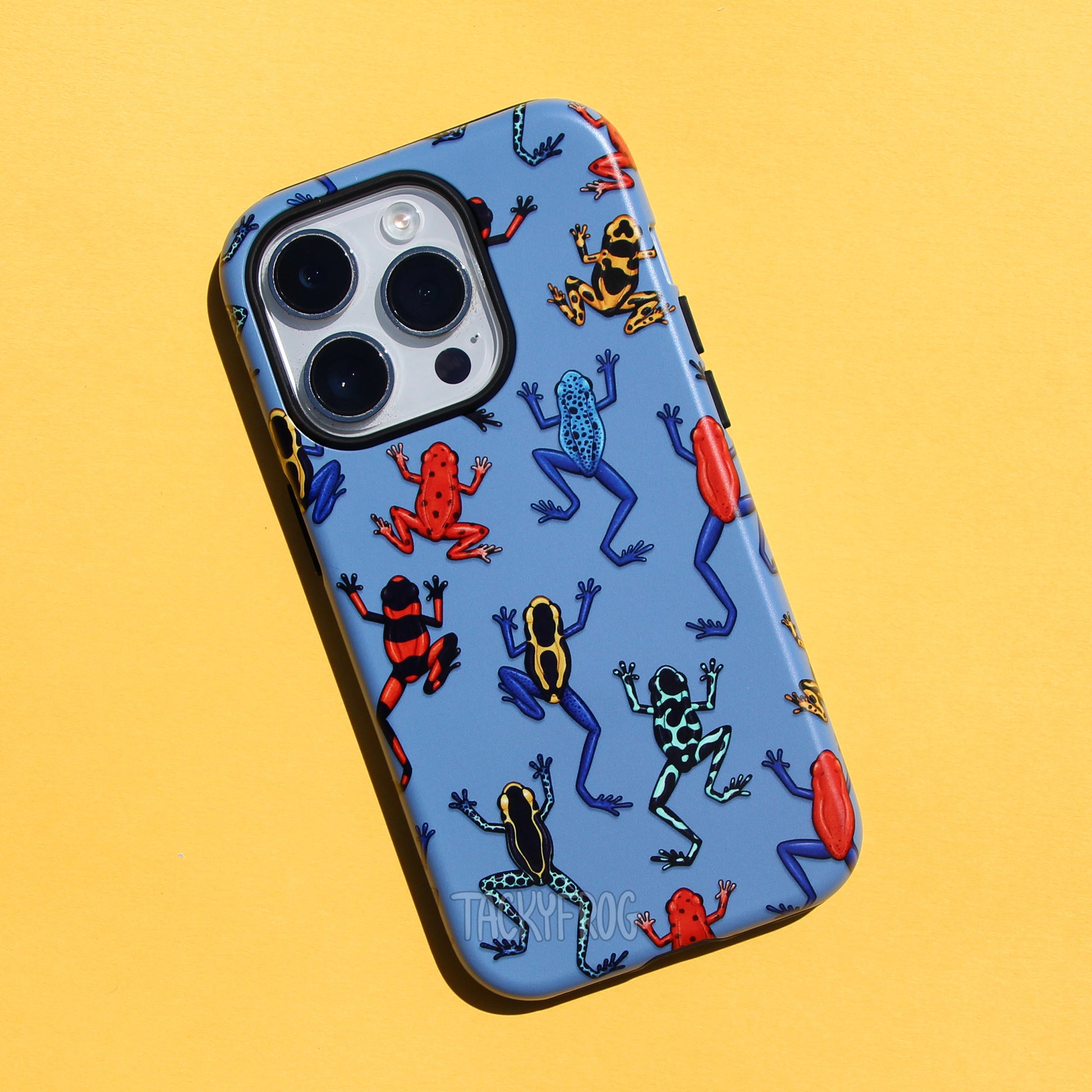 A blue phone case featuring a pattern of various dart frogs.