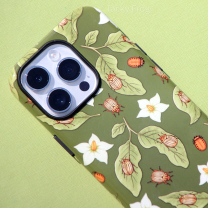 A close up of the potato beetle phone case. The pattern features illustrations of potato beetles, their larvae, and potato plant leaves and flowers.