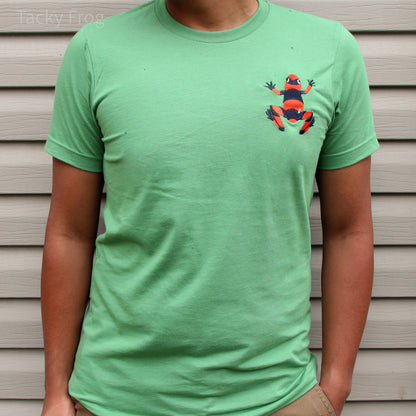 A leaf green-colored t-shirt featuring a machine-embroidered red dart frog.