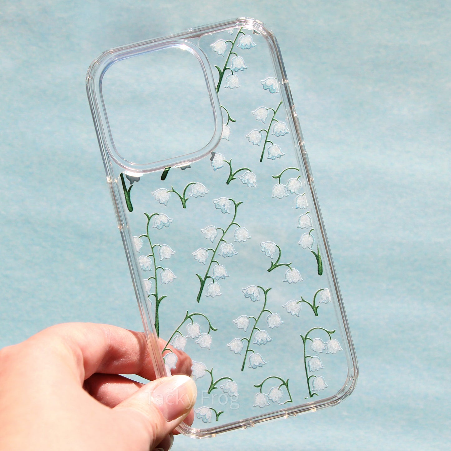 The lily of the valley phone case on its own.