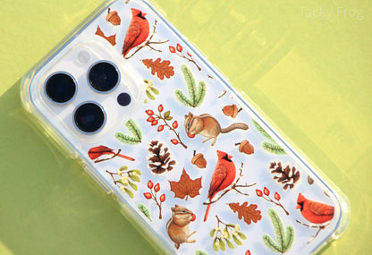 A closeup of the detailed on the winter foraging phone case, shown on a light-colored phone.