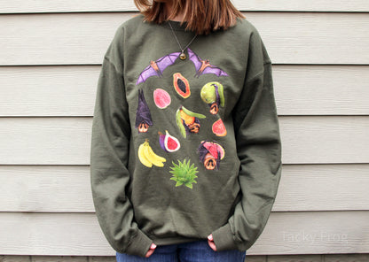 Another view of the fruit bat unisex sweatshirt. Among the fruits and plants included are agave, banana, papaya, figs, and guava.