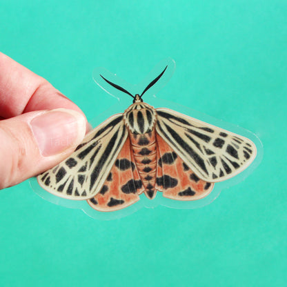 A clear vinyl sticker of a tiger moth.