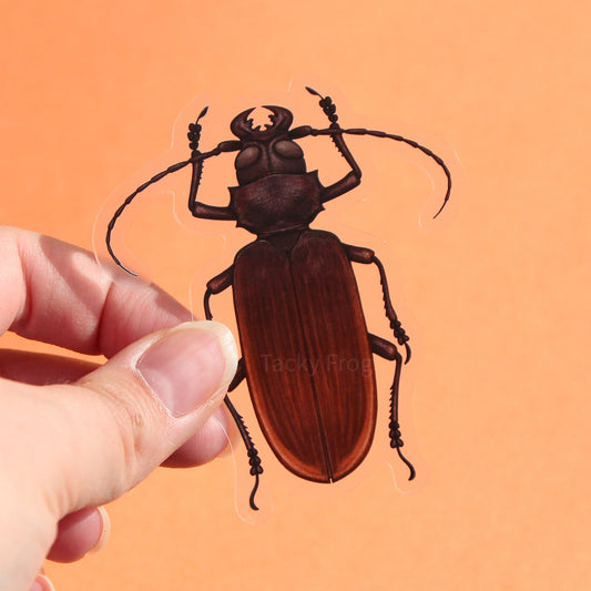 A clear vinyl sticker of a titan beetle.