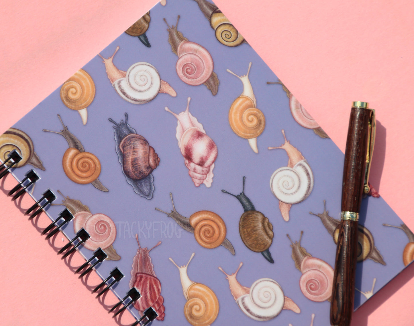 A closeup of the design on the notebook.