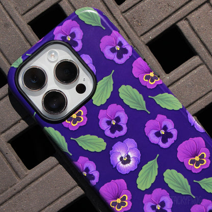 A close up of the details on the purple pansies phone case.