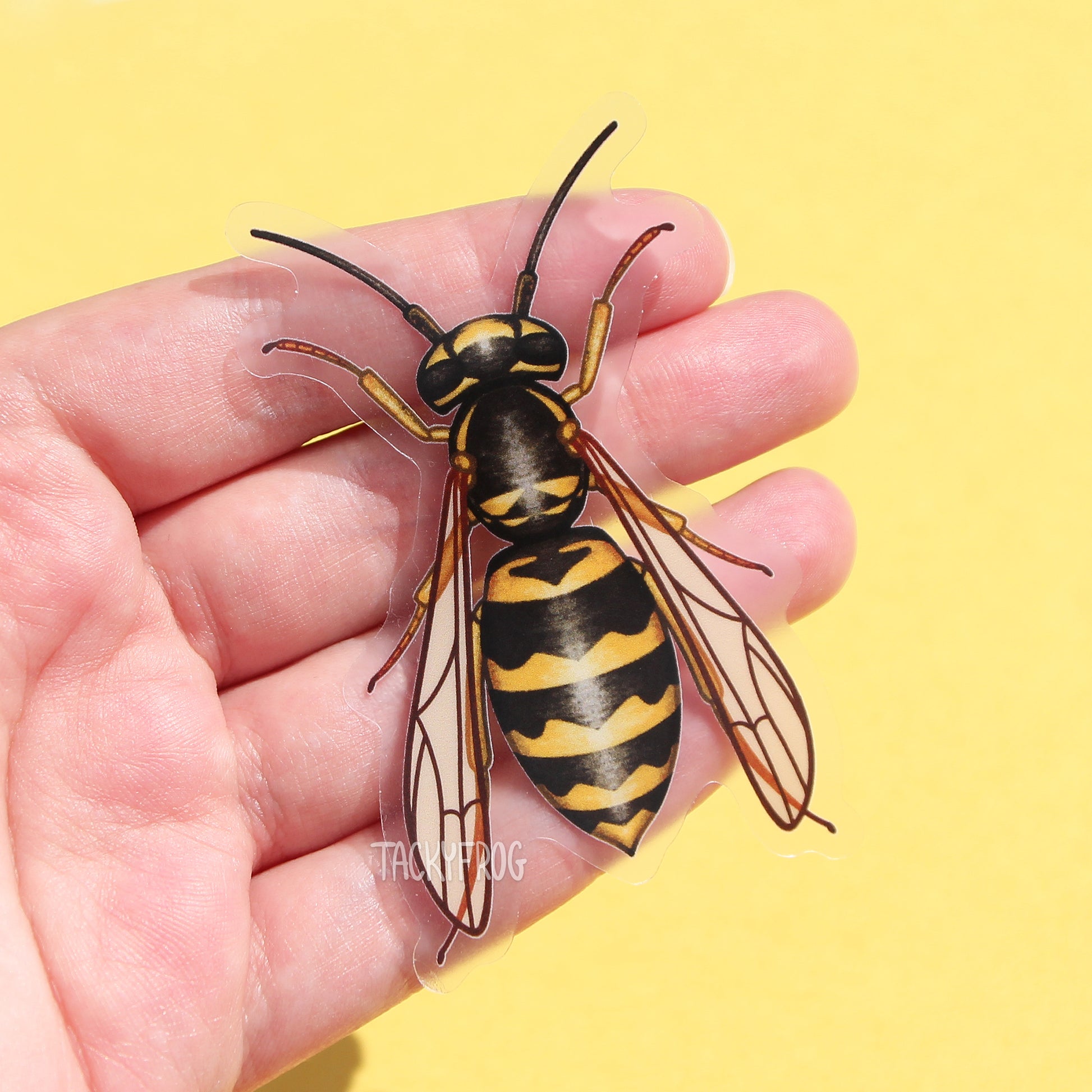 A clear vinyl sticker of a yellow jacket wasp.