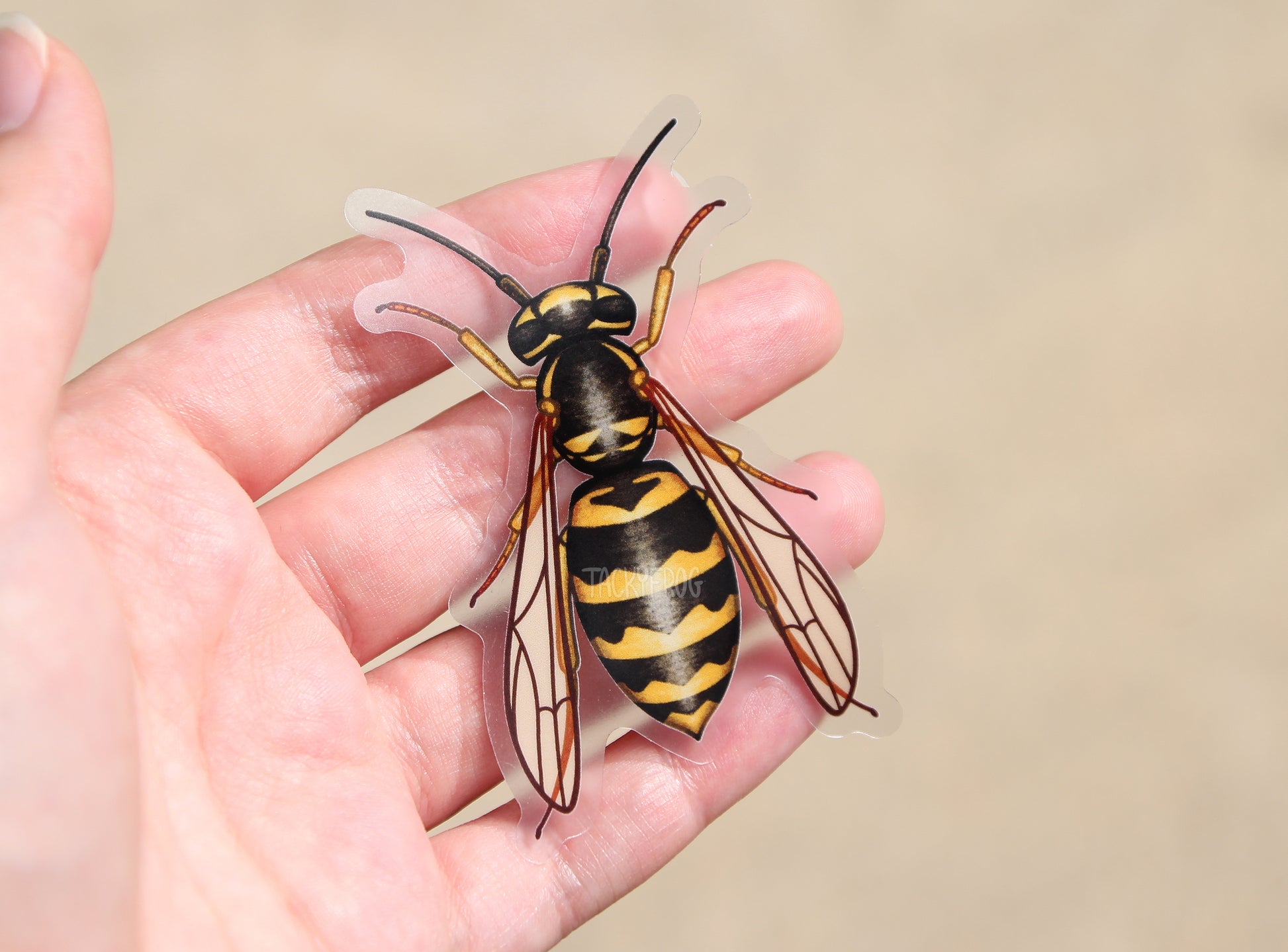 A clear vinyl sticker of a yellow jacket wasp.