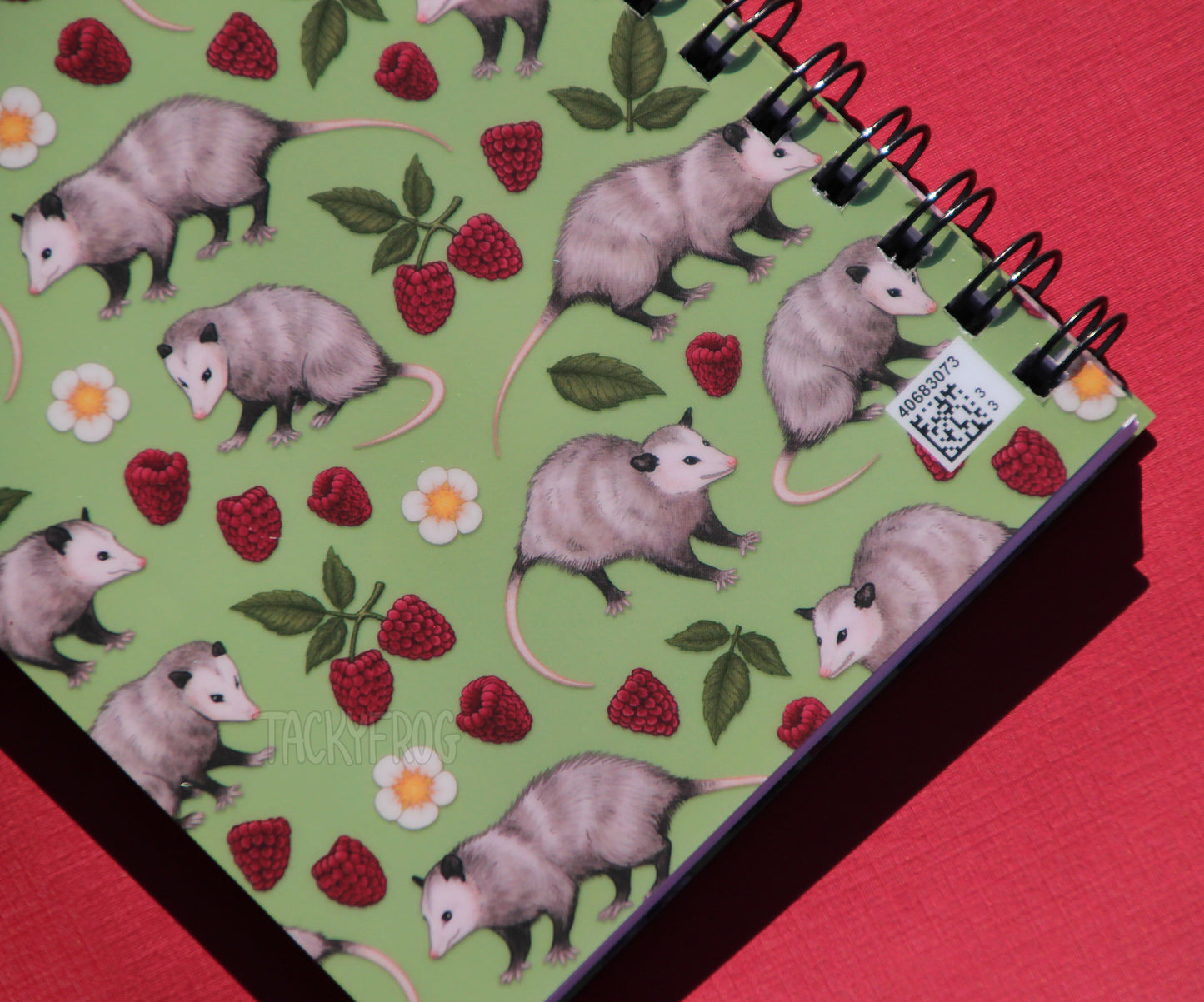 There is a small QR code in the bottom right corner of the back cover.