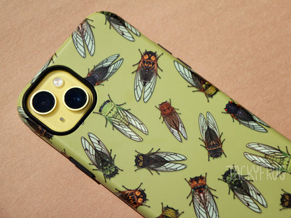 A close up of the details on the cicada case. The case has two layers. The inner layer of the case is solid black and visible around buttons and openings.