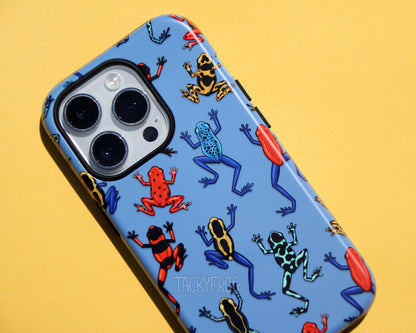 A close up of the dart frog blue phone case, which features a pattern of various yellow, blue, and red dart frogs.