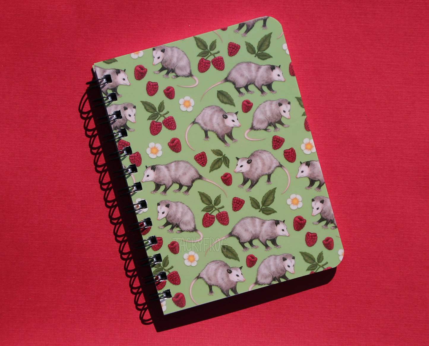 Another view of the opossums notebook.