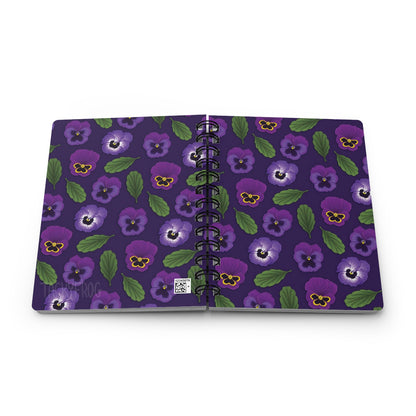 A mockup of the purple pansy notebook. open so that both covers are showing. Please note there is a small QR code for manufacturing reference in the bottom right corner of the back cover