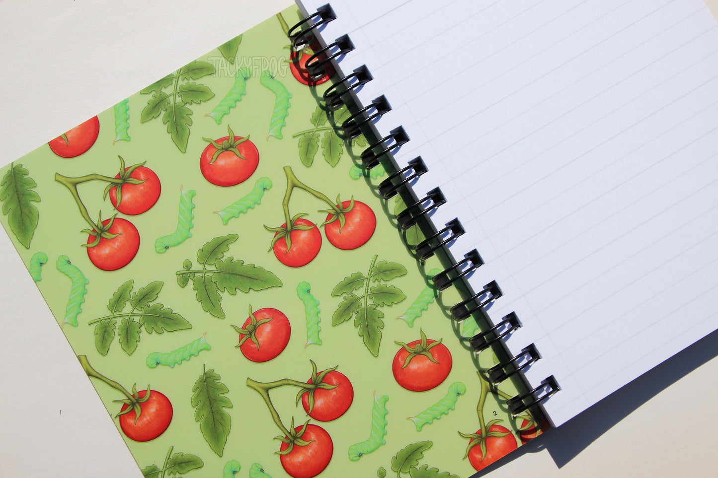 Both sides of the front and back cover feature the colorful design.