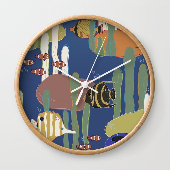 A wall clock featuring a fish and sea plants design