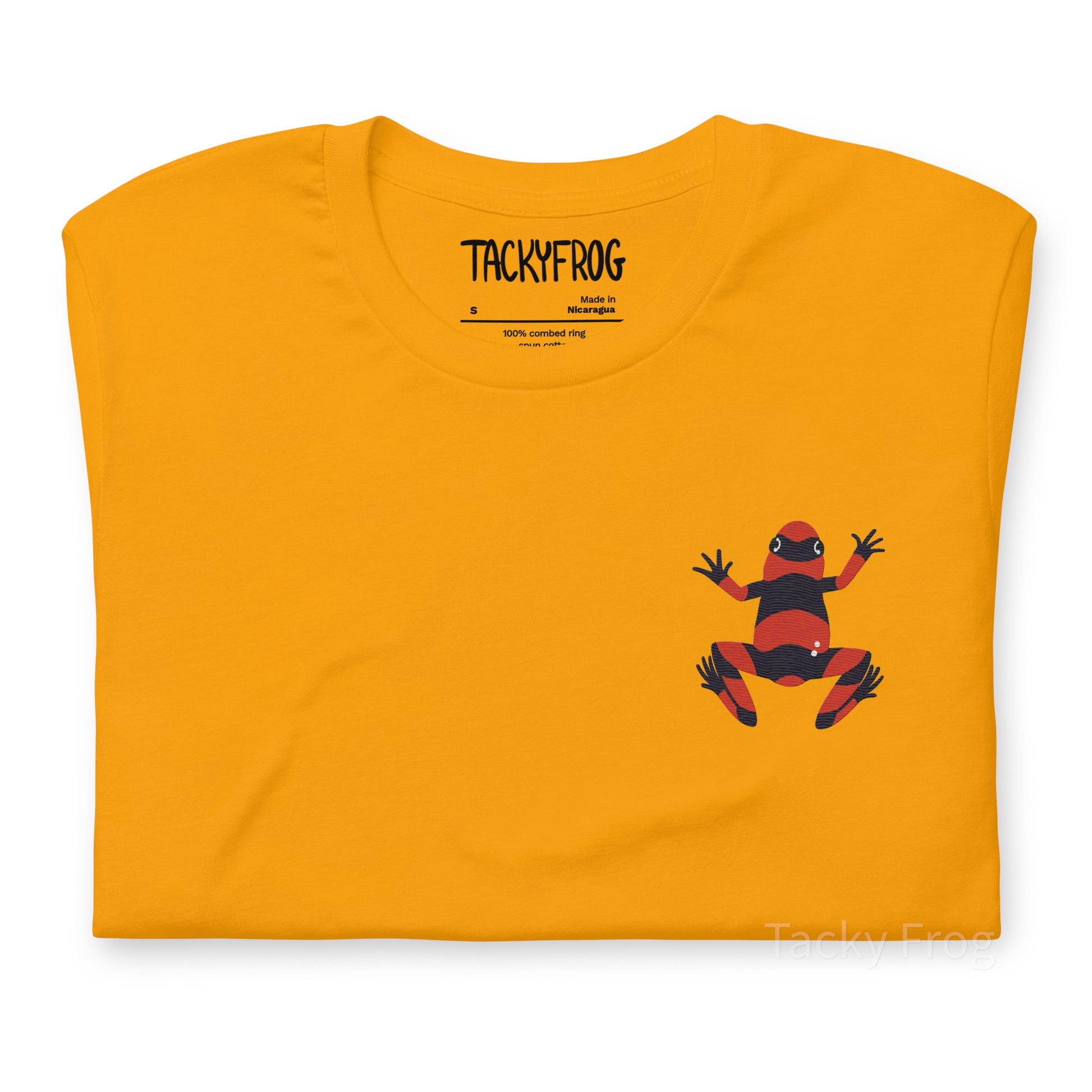 A mockup of the dart frog embroidered shirt in the color "gold".