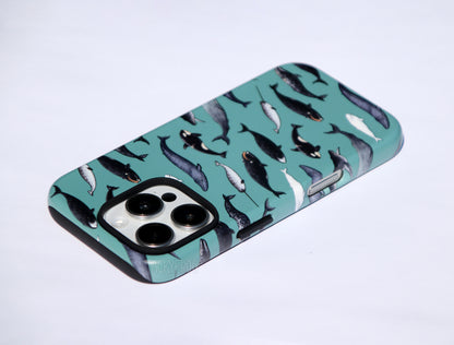 An angled view of the whale phone case showing a better view of the inner layer of the phone case, which is solid black and visible around openings and buttons.