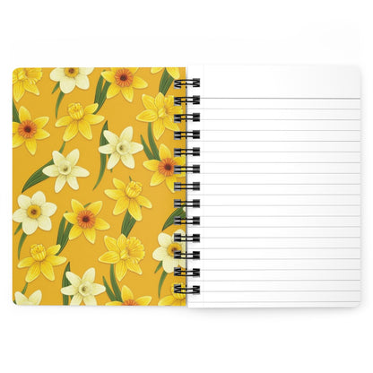 A mockup of the inside of the yellow daffodils mini notebook. Both sides of both covers feature the colorful pattern.