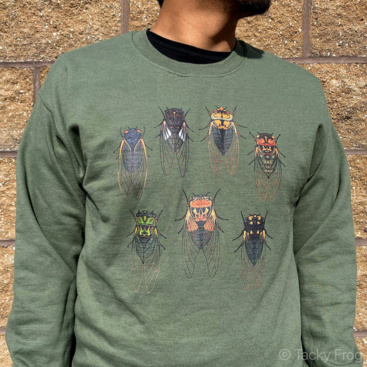 A green sweatshirt with cicadas on it.