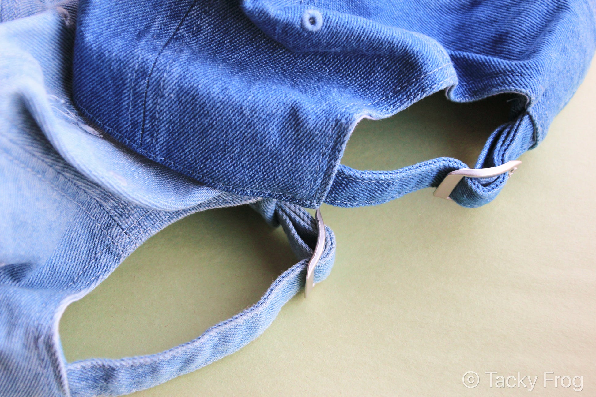 Comparison of the light blue and blue denim baseball caps.