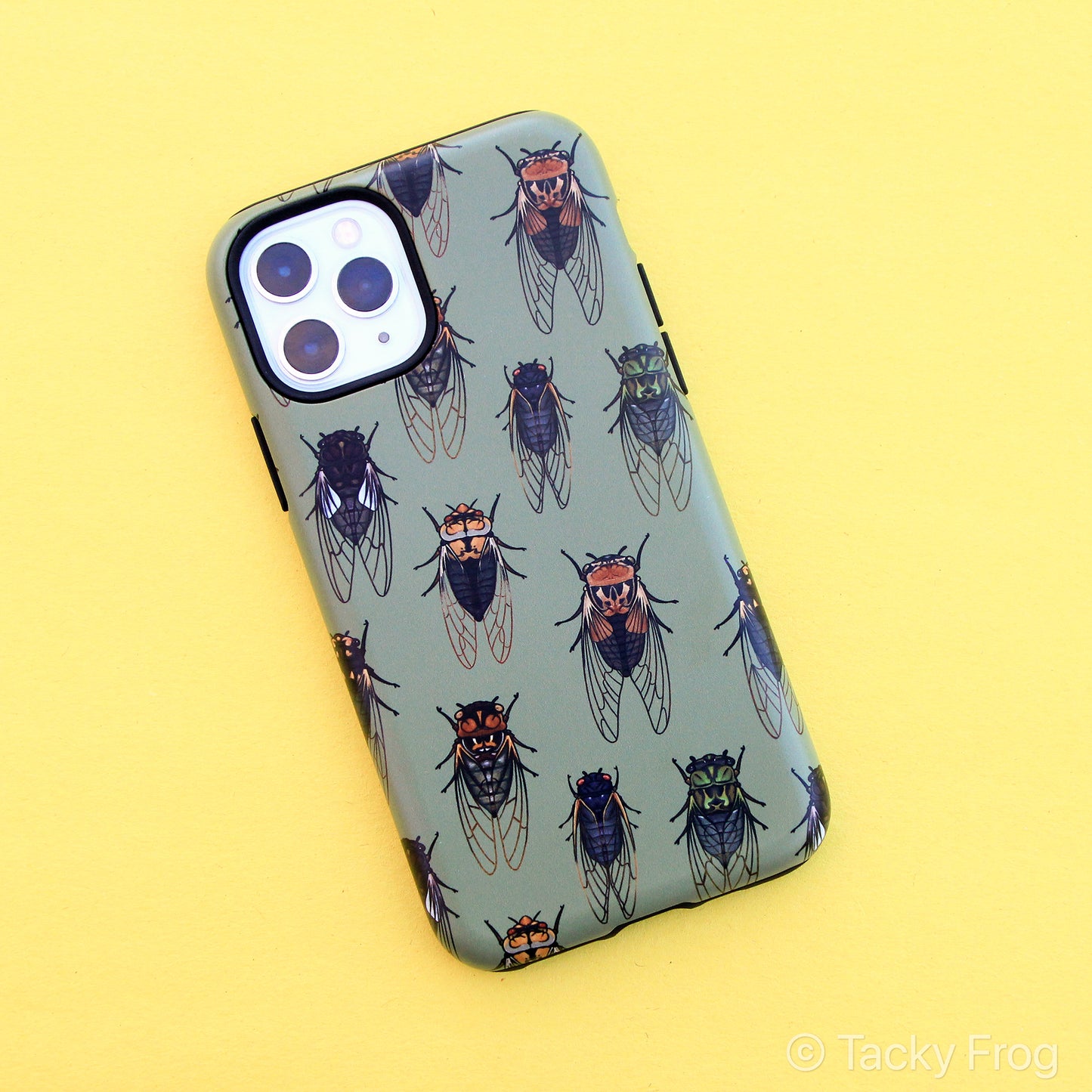 A green phone case, shown on an iPhone, with a cicada pattern on it.