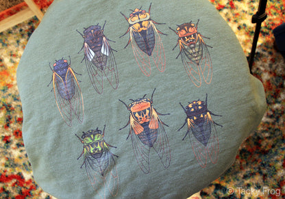 Closeup of the cicada design on the sweatshirt