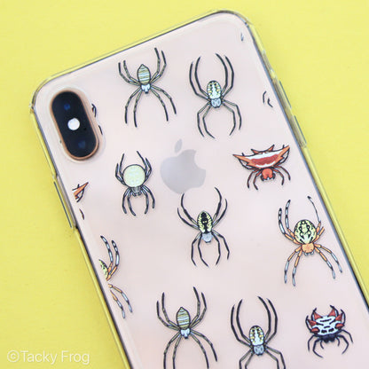 Close-up of a clear iPhone case with a spider design on it.