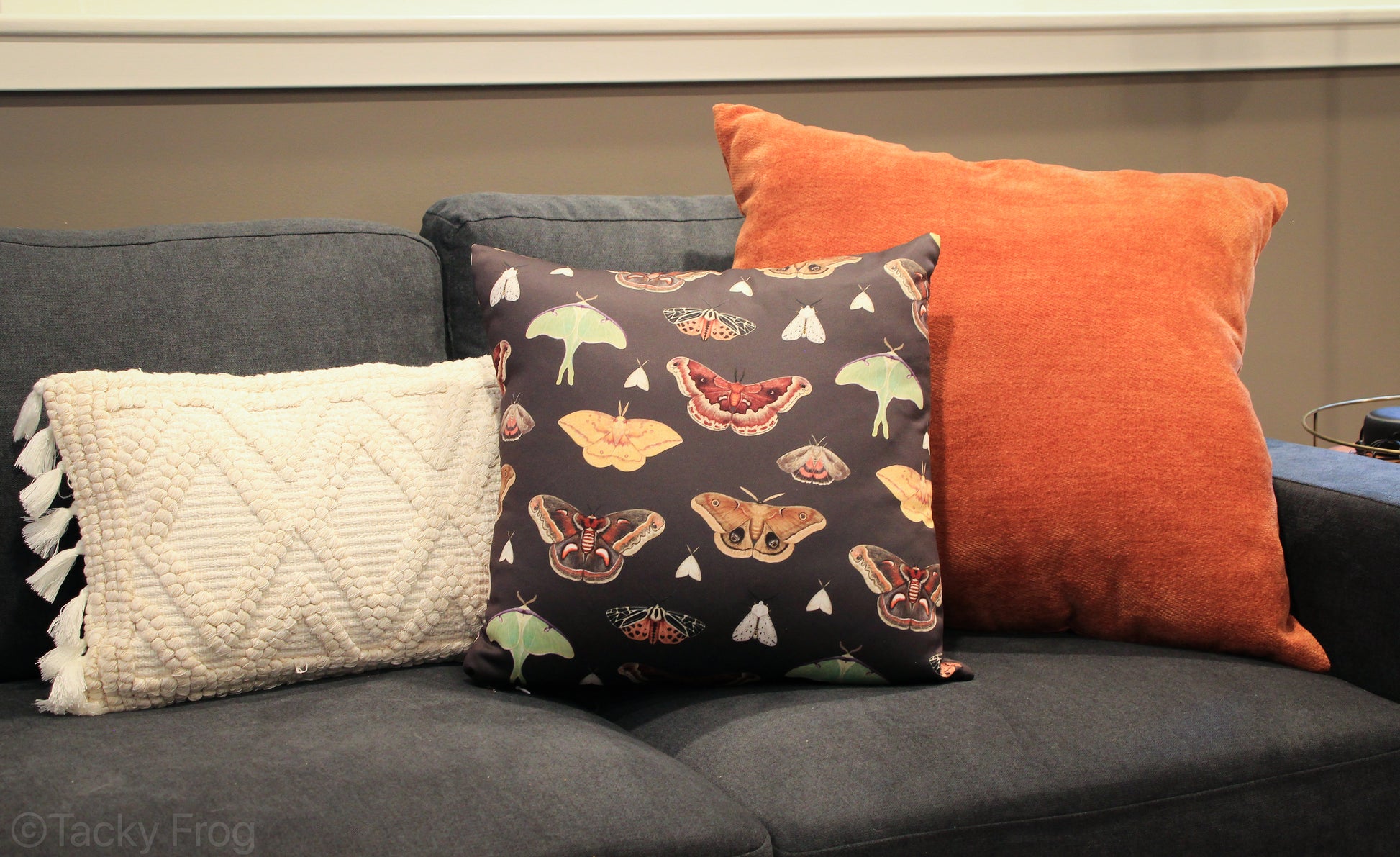 An example of how the moth pattern pillow could look with complimentary pillows.