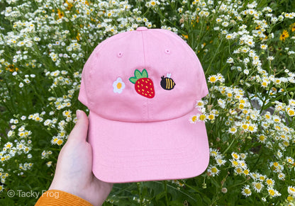 Another view of the embroidered strawberries and bees hat.