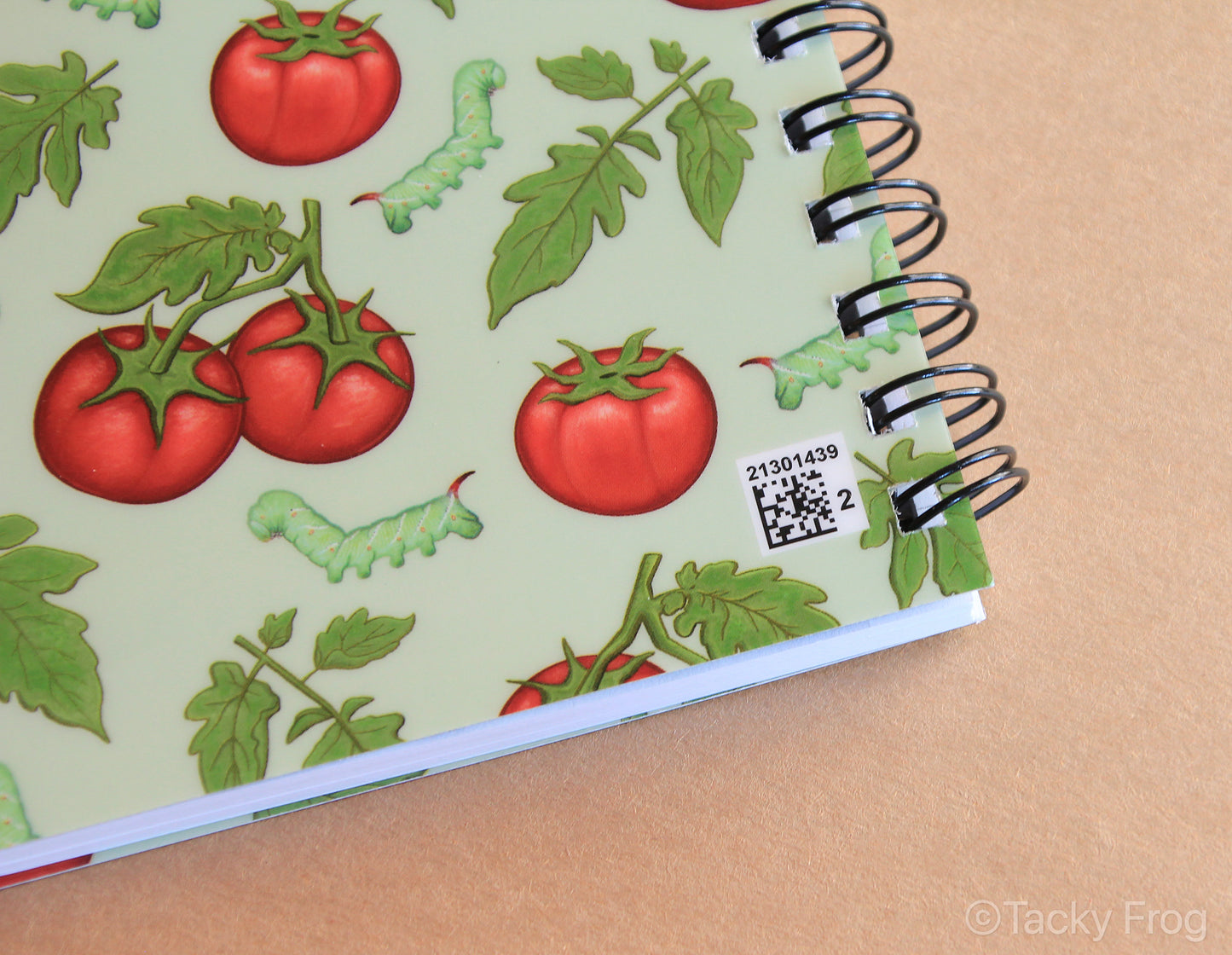 There is a very small barcode on the back of the tomato hornworm caterpillar notebook.