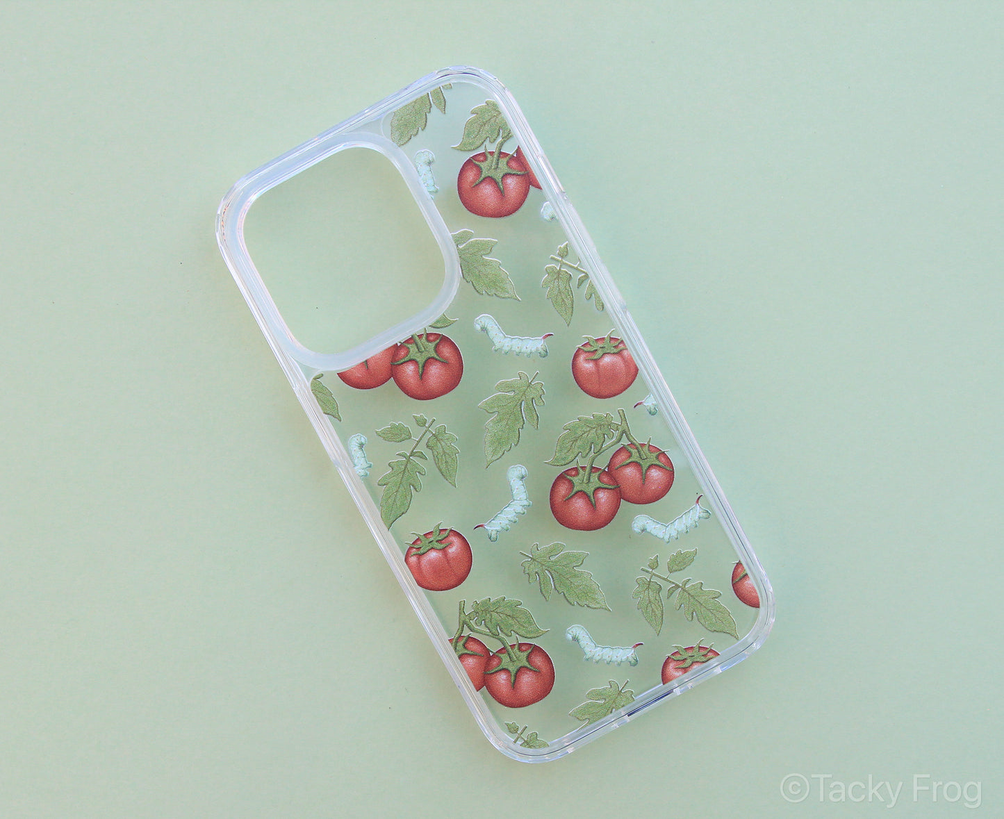 The clear tomato hornworm phone case shown on its own.