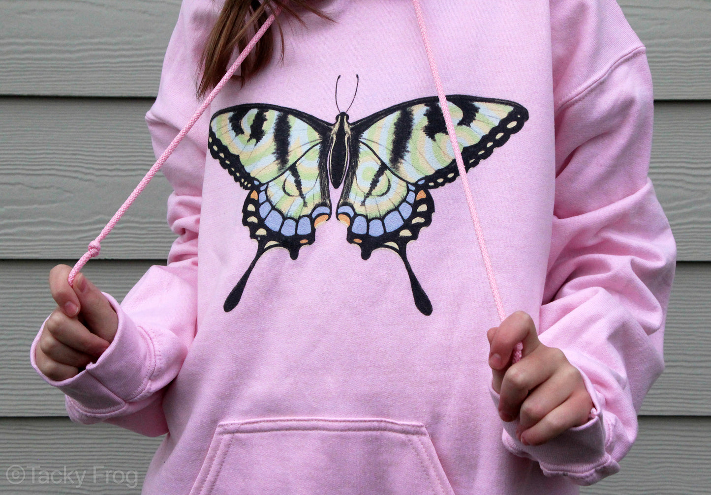 A pink hoodie with a swallowtail butterfly on it.