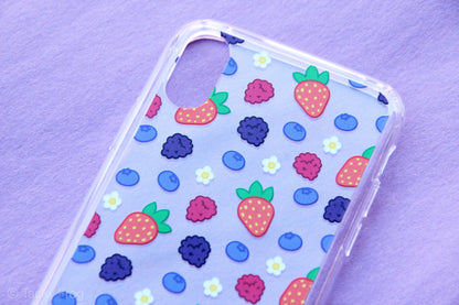 A clear phone case with a mixed berries and daisies pattern.