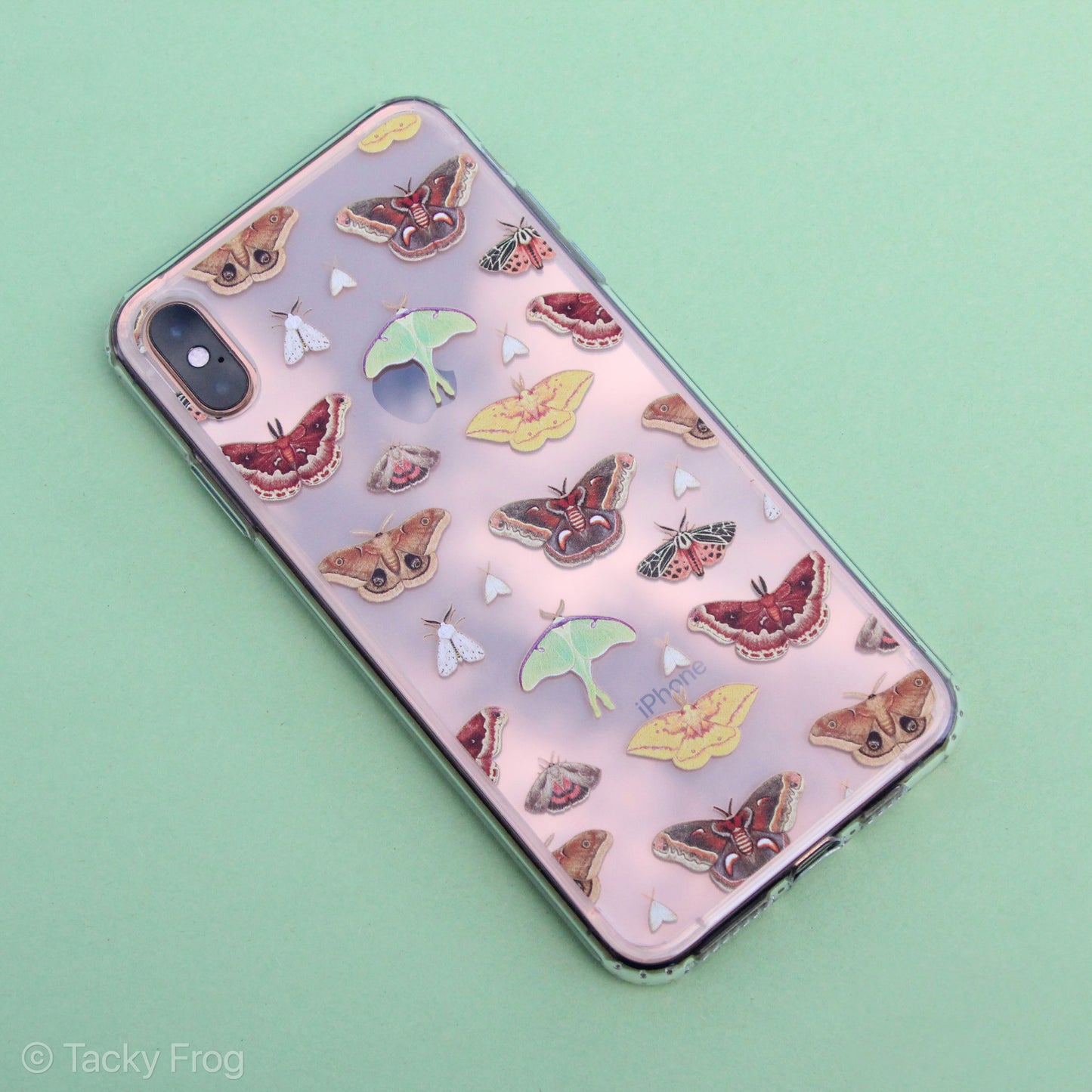 A clear phone case featuring a repeating pattern of various moths. It is shown on an iPhone XS Max.