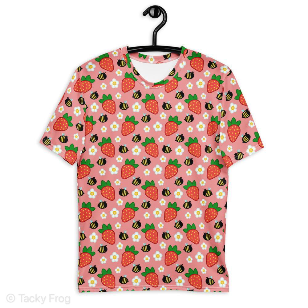 A mockup of the strawberries and bees all over print shirt on a clothes hanger. 