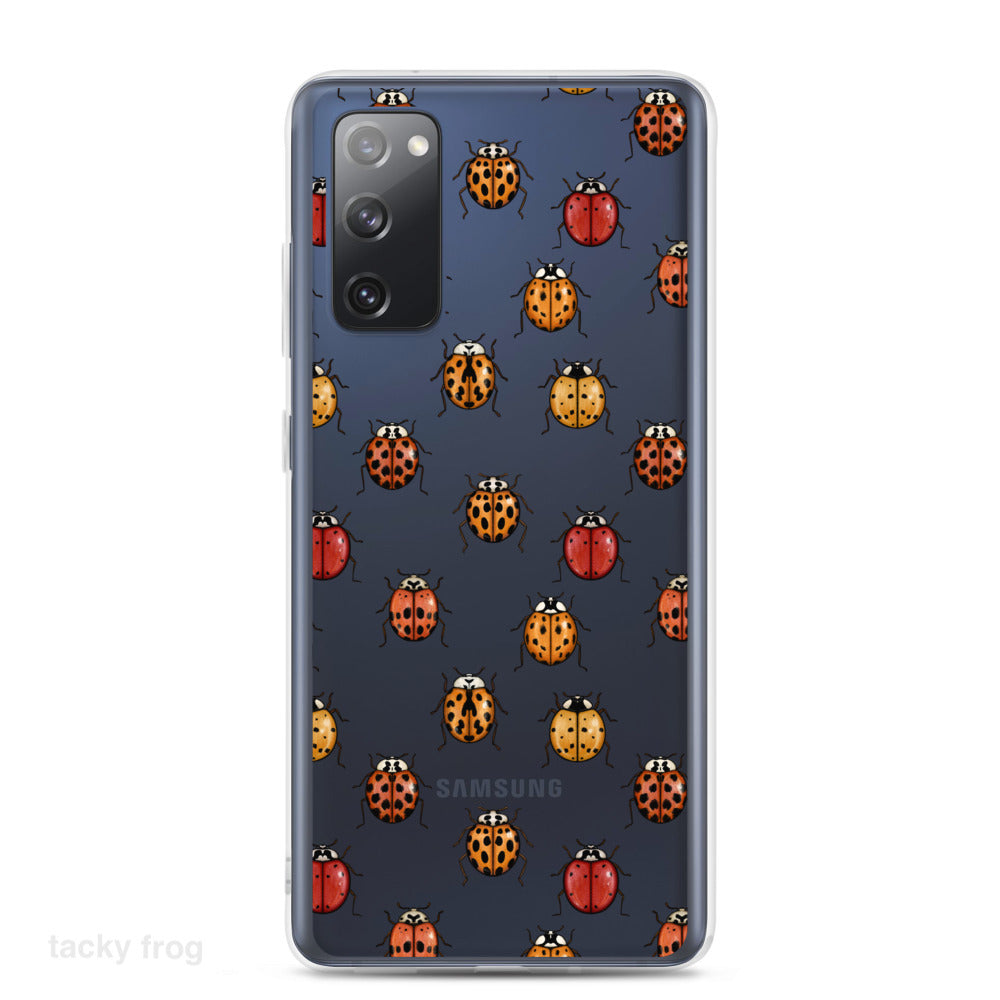 A mockup of a clear phone case with a ladybug pattern on it. It is shown on a Samsung Galaxy.