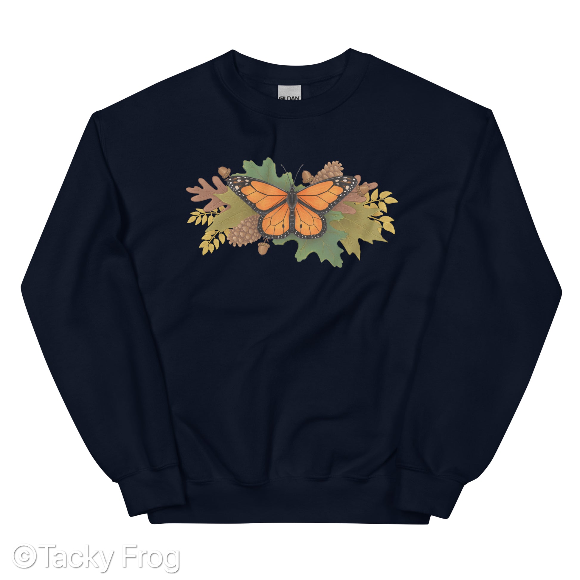 A mockup of a navy sweatshirt with a monarch butterfly and autumn leaves on it.