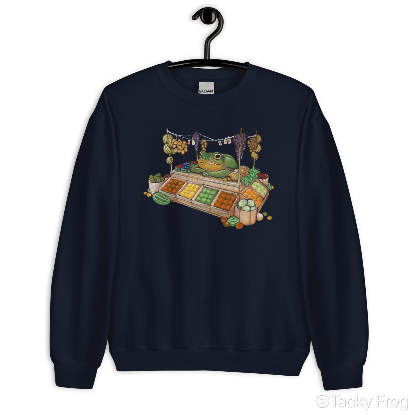 A mockup of the fruit vendor frog design on a navy sweatshirt.