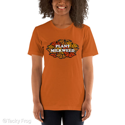 An autumn-colored shirt featuring a monarch butterfly design that says "Plant Milkweed"