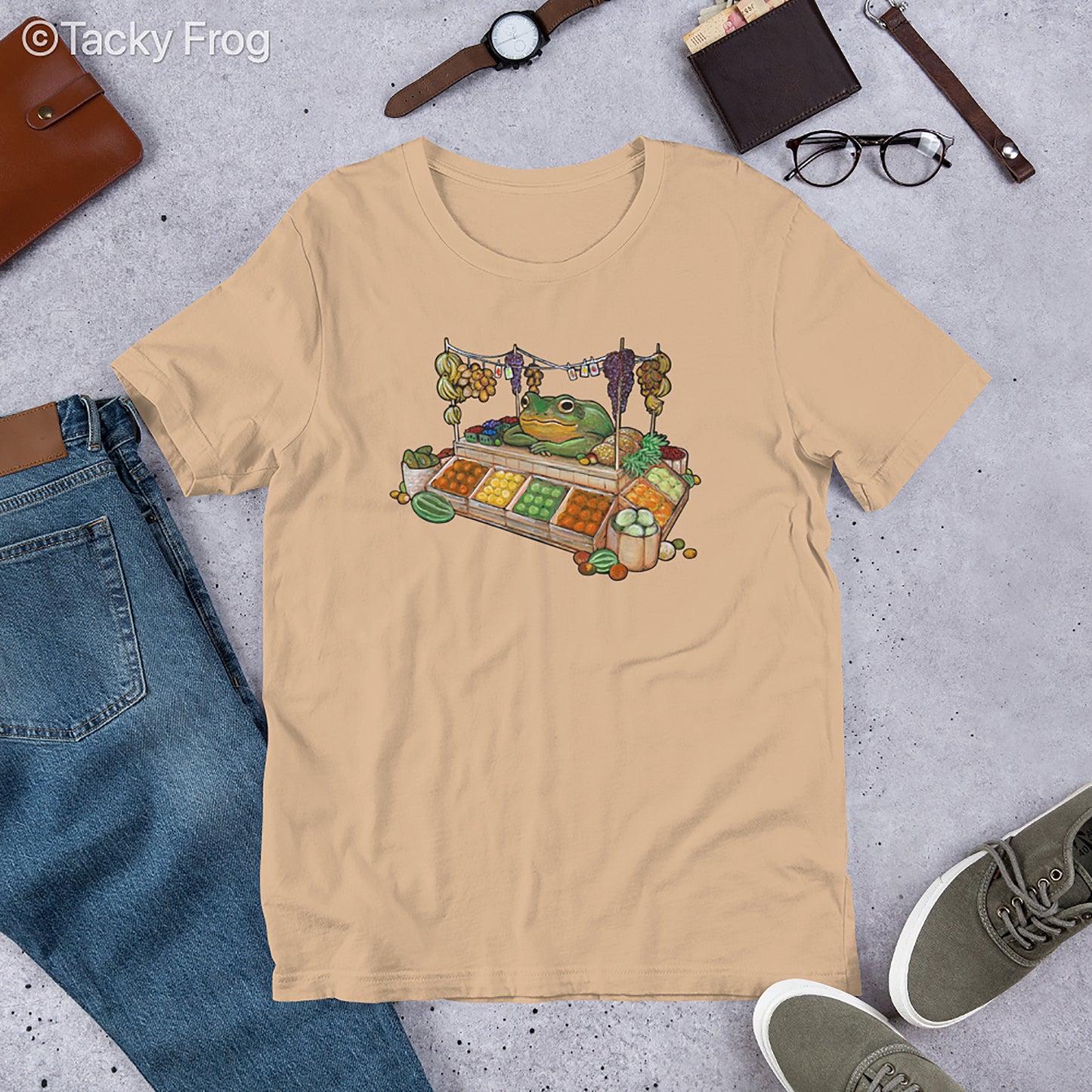 A mockup of the fruit vendor frog shirt in the color Tan.