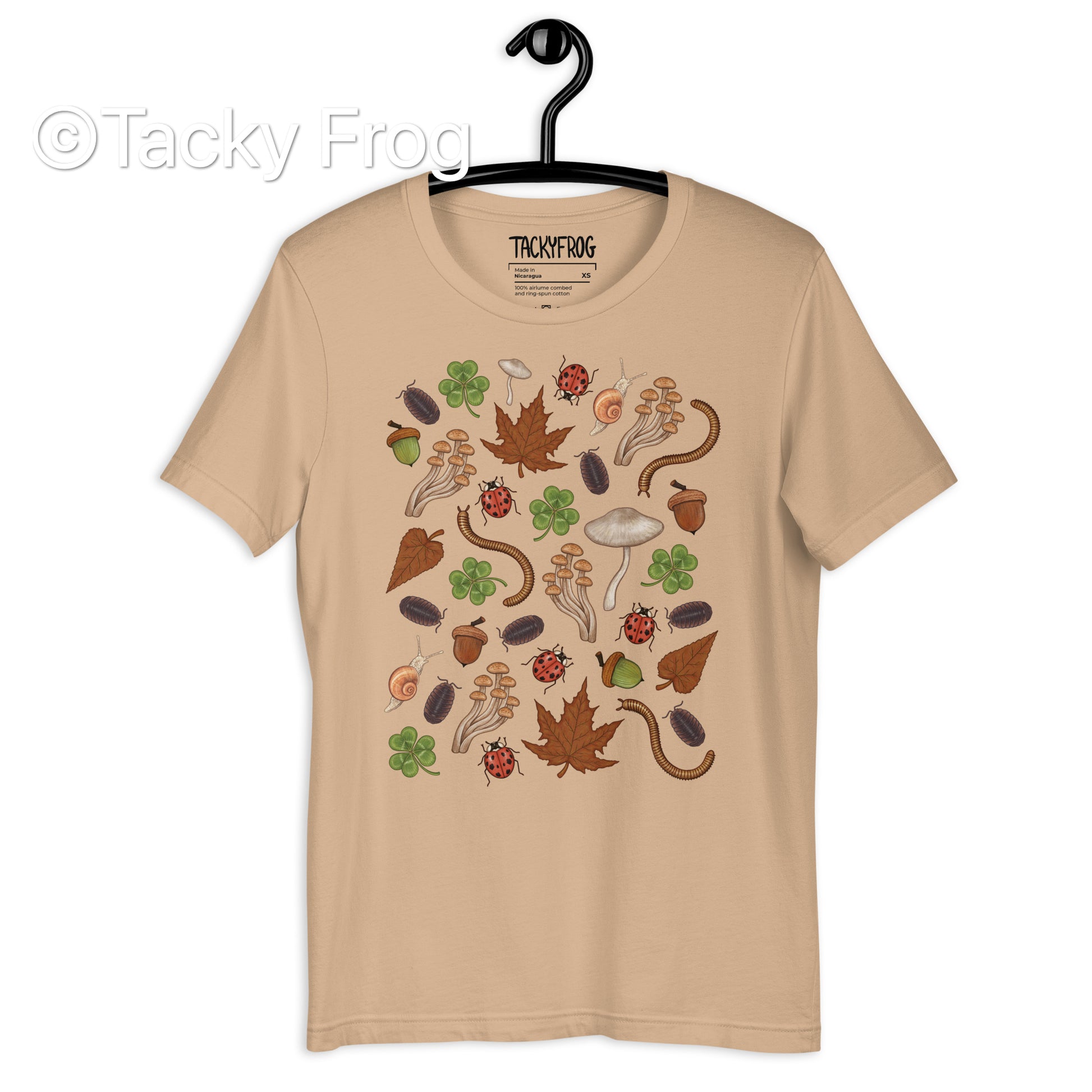 A mockup of the Backyard Finds t-shirt in color Tan.