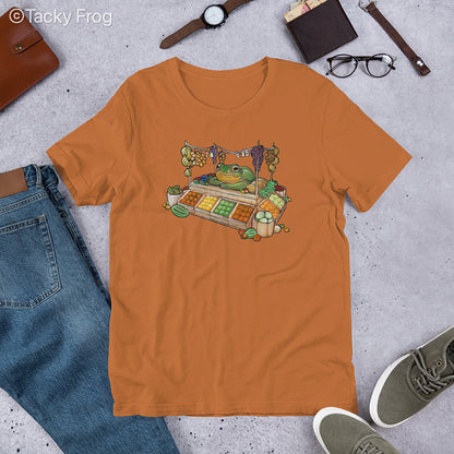 A mockup of the fruit vendor frog shirt in the color Toast.